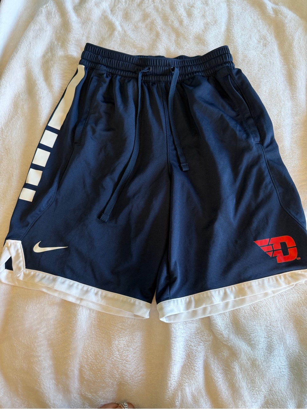 Nike Men’s Navy Blue Athletic Shorts with White Accents and Red Logo